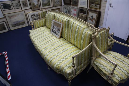 A suite of George III white and gilt seat furniture, comprising five armchairs and a settee, W.6ft 6in.